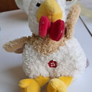 Peluche poulette à noeud papillon